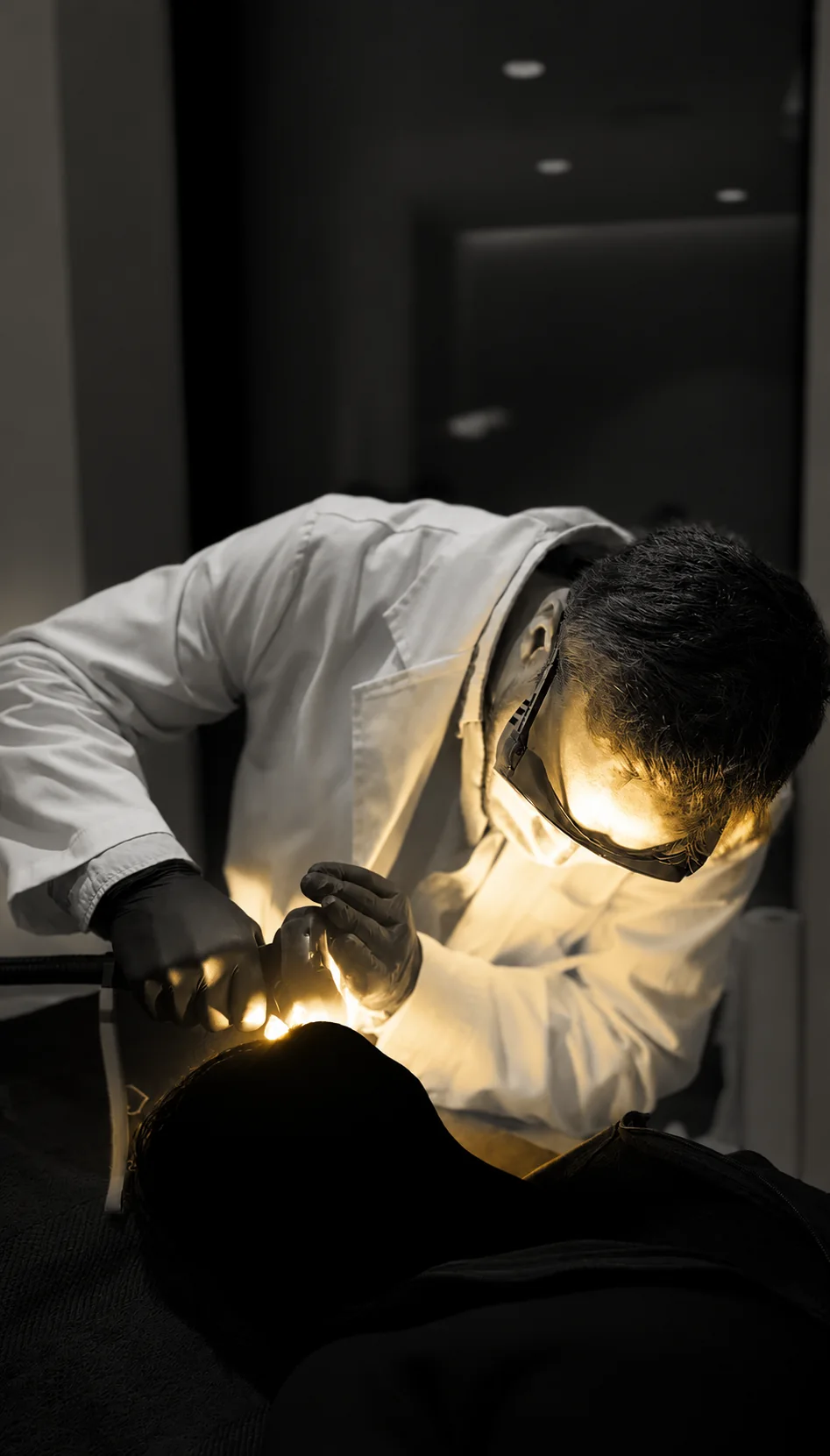 Clinician providing care, with patient anonymized